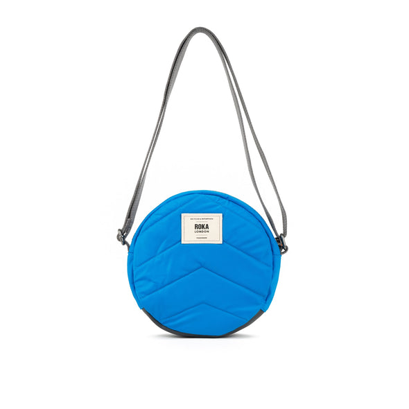 Roka Paddington B Neon Blue Recycled Canvas Crossbody Bag - Small