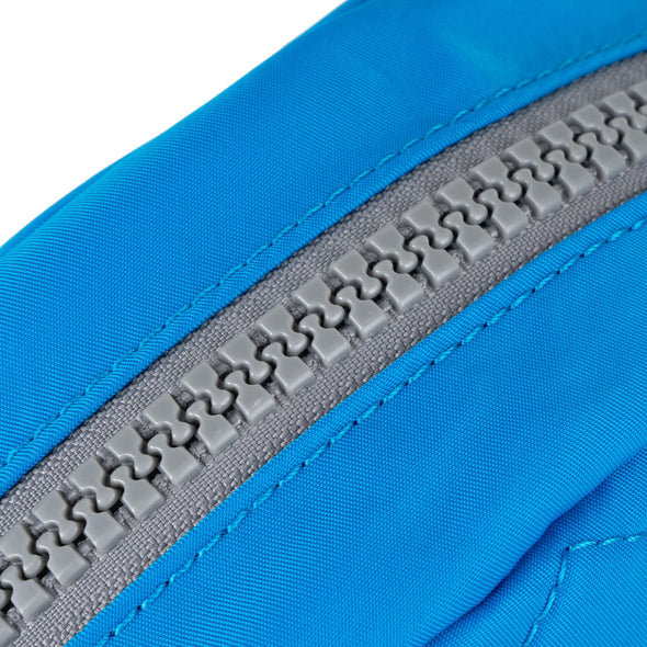 Roka Paddington B Neon Blue Recycled Canvas Crossbody Bag - Small